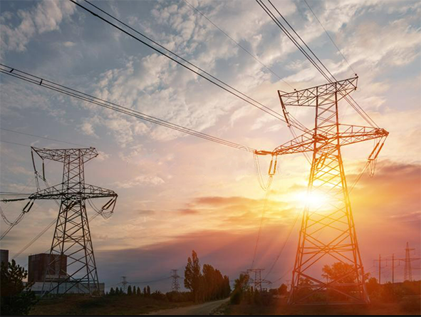 transmission lines and sunset behind
